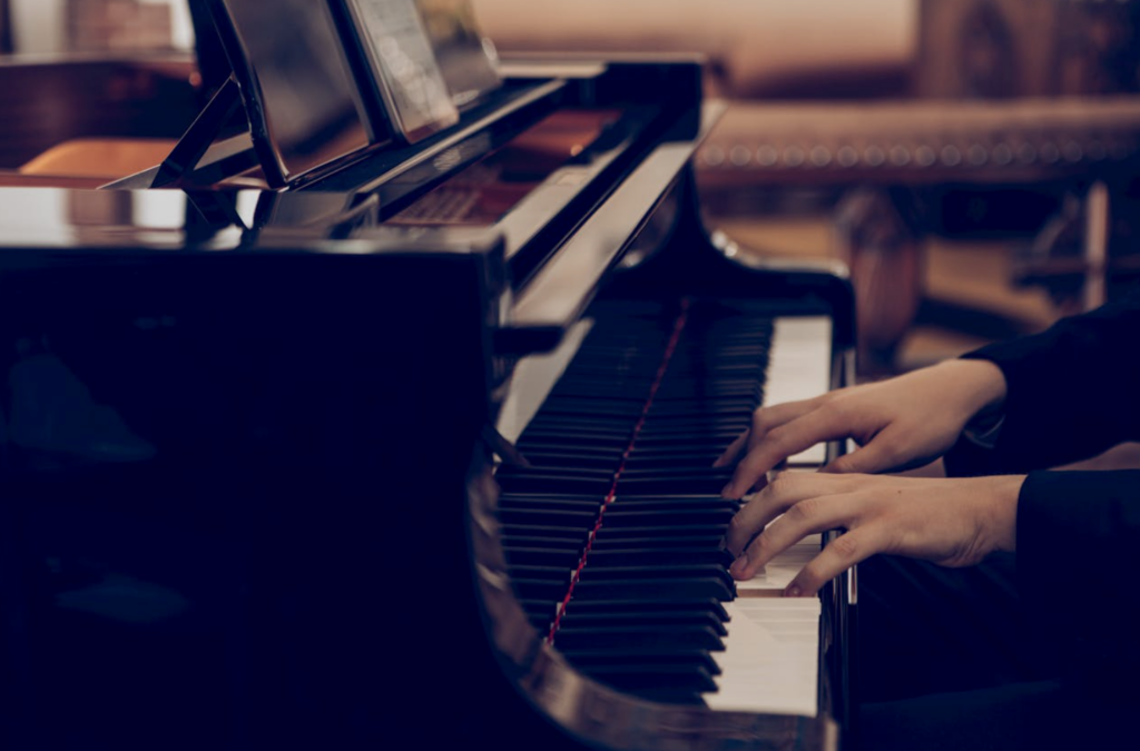 picture of a woman's hand playing piano